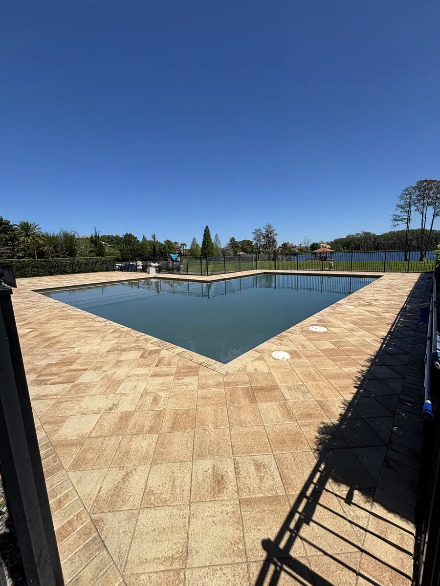 Sealed travertine pool deck with warm colour restored